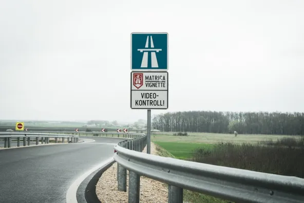 Matrica Vignette and Video-Kontroll enforcement sign at the M4 motorway entry point at the Borș–Ártánd border crossing into Hungary, photographed by Mattijs Wijnmalen on Easter 2026.
